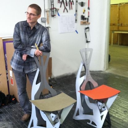 Alexander Gendell with two Leaf chairs in his workshop