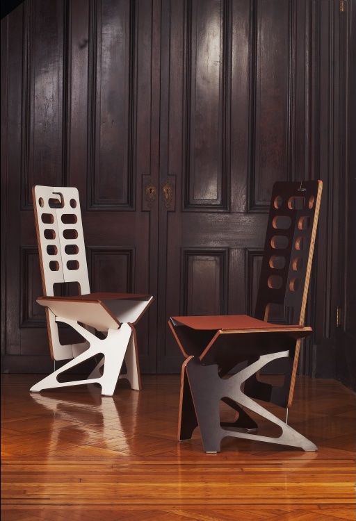 A white and coffee Maya folding chairs